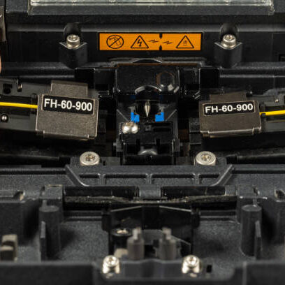 optical fiber welding workflow, stacking holders in a welding machine, close-up